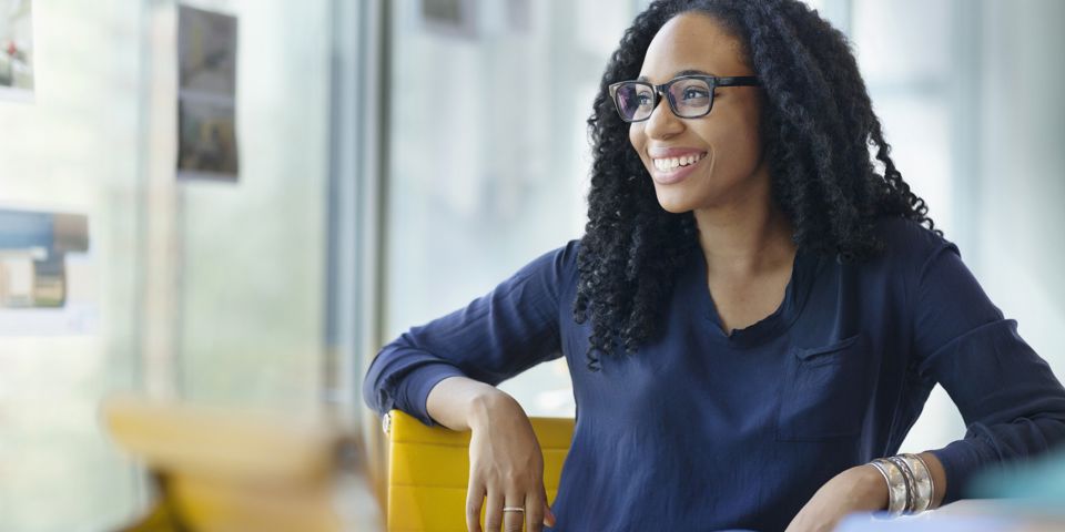 Woman wearing spectacles smiling