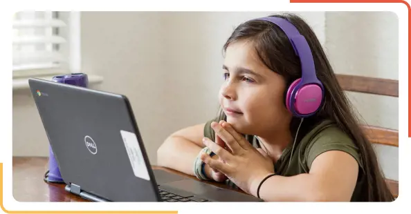 young girl watching laptop screen