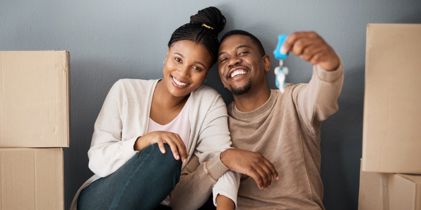 Couple sitting in their new home