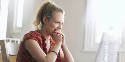 woman sitting at desk