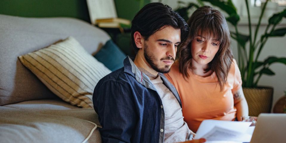 couple looking at laptop