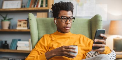 dude holding a mug