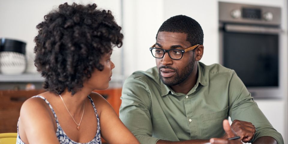 two people discussing