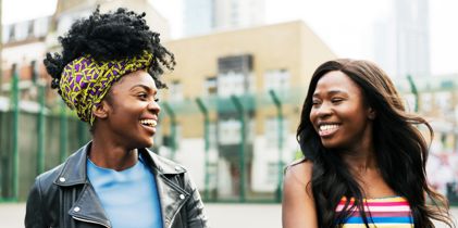 two people smiling at each other