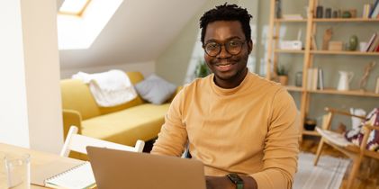 man on laptop at desk